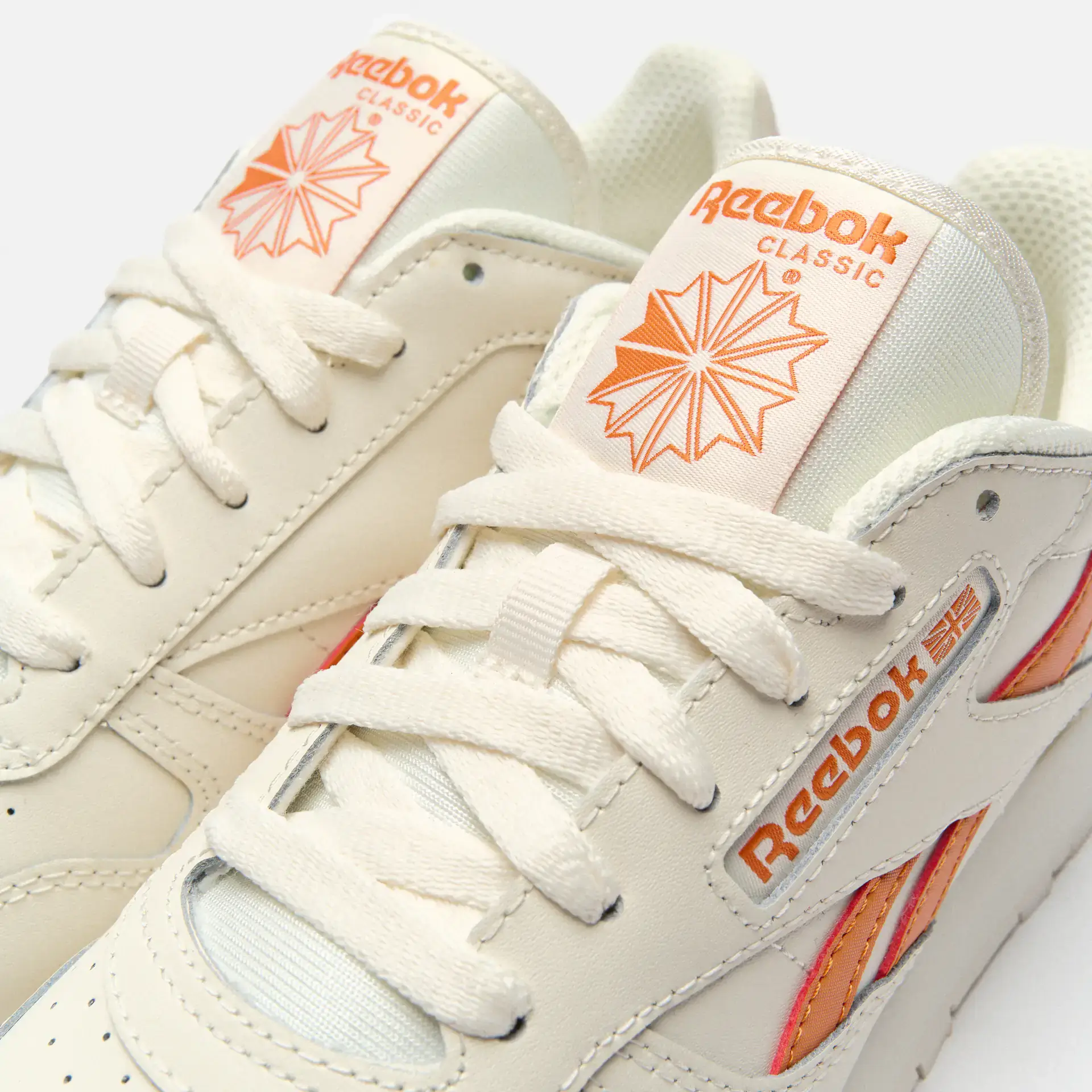 Reebok leather orange deals