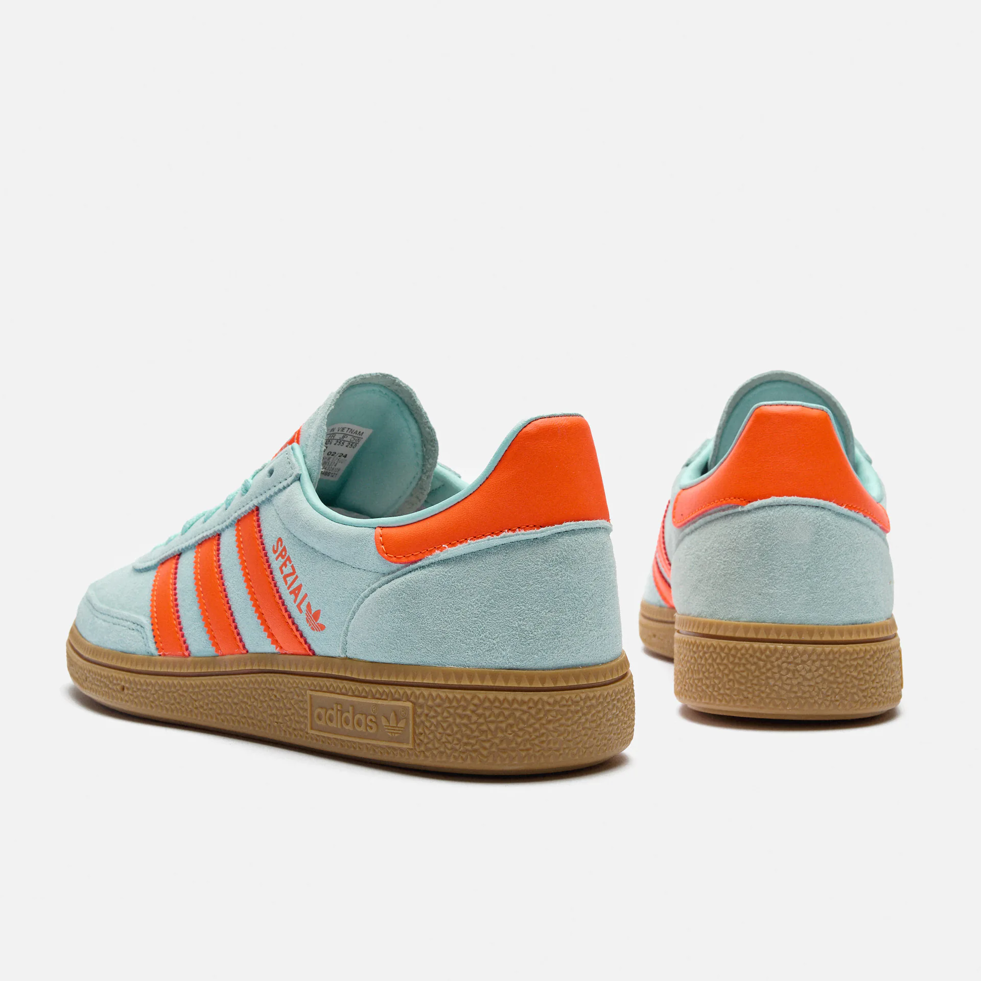 Aqua and orange sneakers on sale