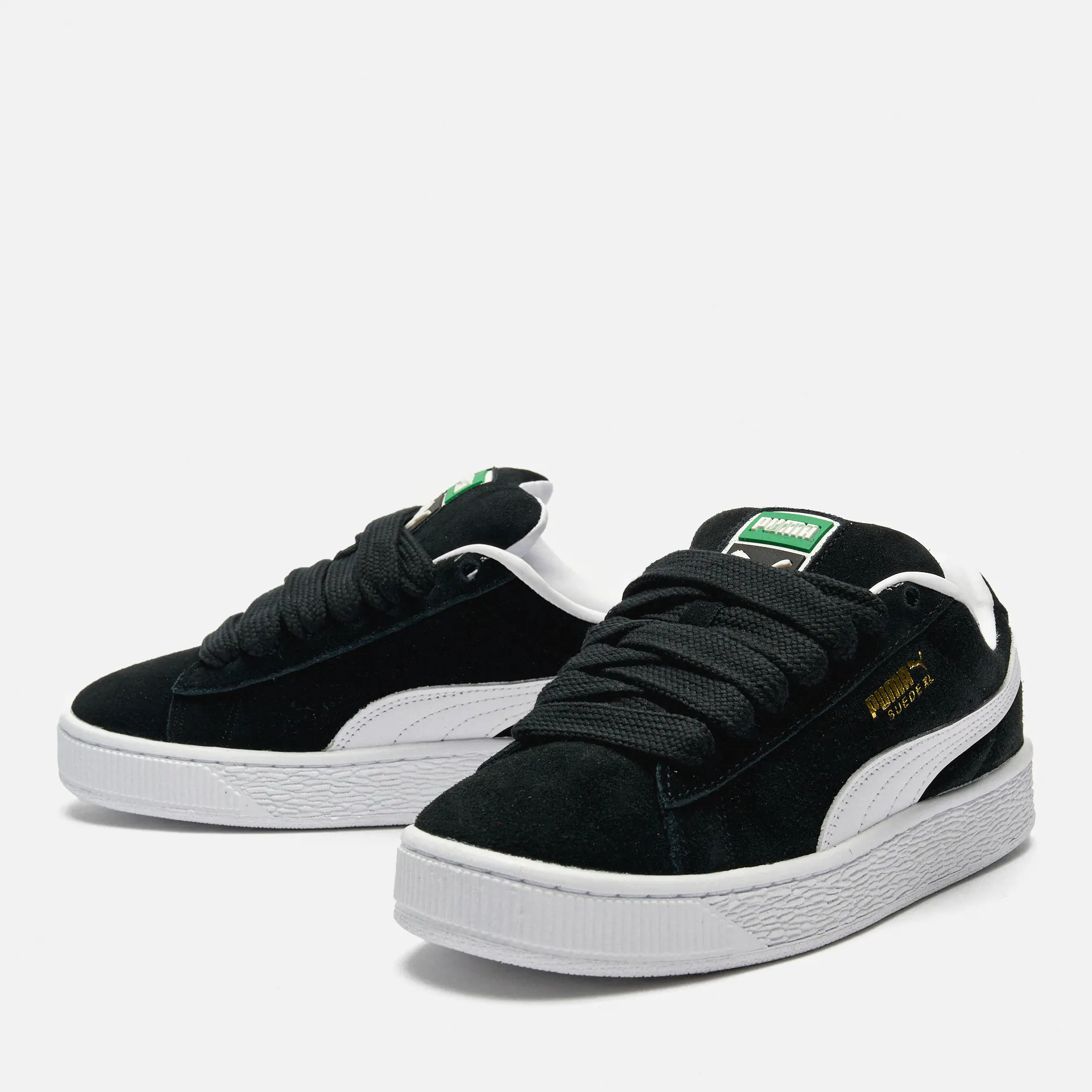 Black and white classic pumas online